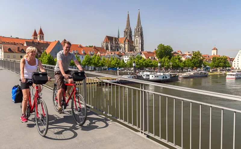 Regensburg Cathedral, excursion boat, cyclist