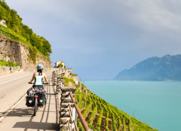 Rhône Cycle Route, cyclist at Lake Geneva