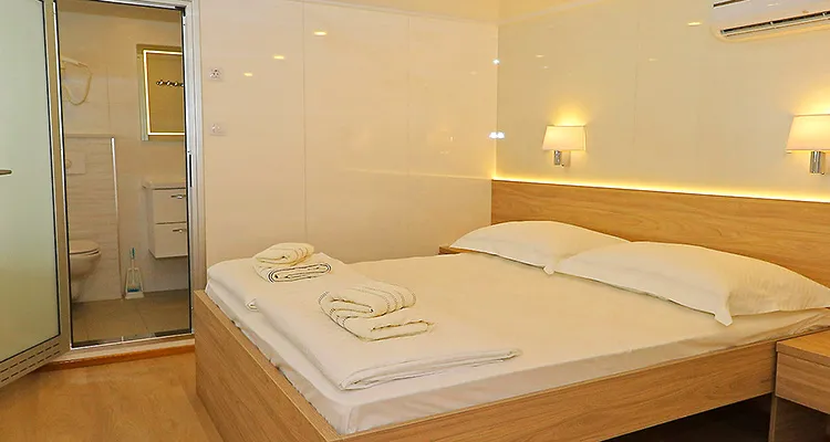MY Relax, main deck cabin with french bed